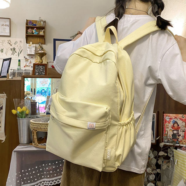 Hua Xi genuine When I Fly to You Su Zaizai same style bag milk yellow backpack college student backpack female school bag