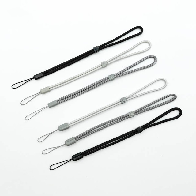 Mobile phone lack rope wrist rope Men and female personalized creative small micro single CCD camera wristband Airpods Pro2 headset latch rope U disk camisole simple mobile phone key pendant
