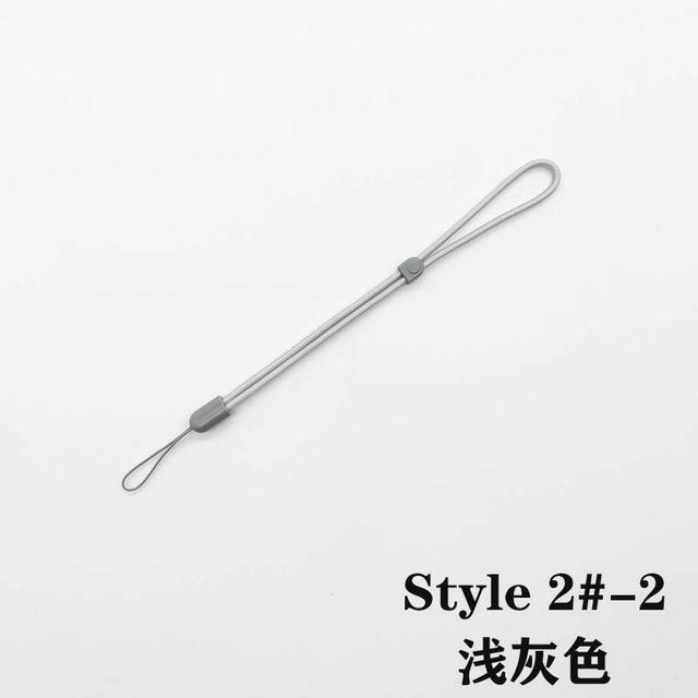 Mobile phone lack rope wrist rope Men and female personalized creative small micro single CCD camera wristband Airpods Pro2 headset latch rope U disk camisole simple mobile phone key pendant
