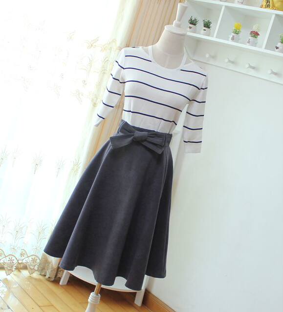2022 autumn and winter women's clothing design with bow tie mid-length A-line skirt with high waist slimness and short swaying skirt
