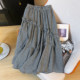 Retro black and white plaid black earring skirt for women in summer irregular A-line thin casual high-waisted long skirt
