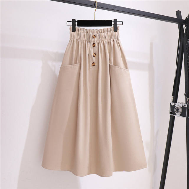 Spring and summer new high -waisted thin waist pine tight waist button decorative pocket design medium long A -line skirt