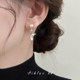 Unique pearl fish tail tassel earrings for women's autumn and winter 2025 new hot style light luxury high-end earrings ear clips