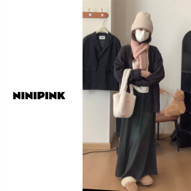 Zhuang Buliang's new temperament high-waist knitted skirt for early autumn, slimming mid-length straight skirt for women