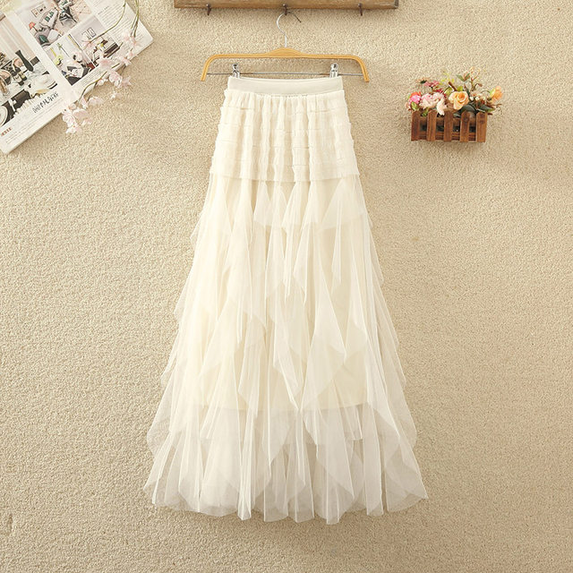 Irregular mesh skirt spring and summer women's new high -waisted puffed lotus leaf cake skirt medium long A -line skirt