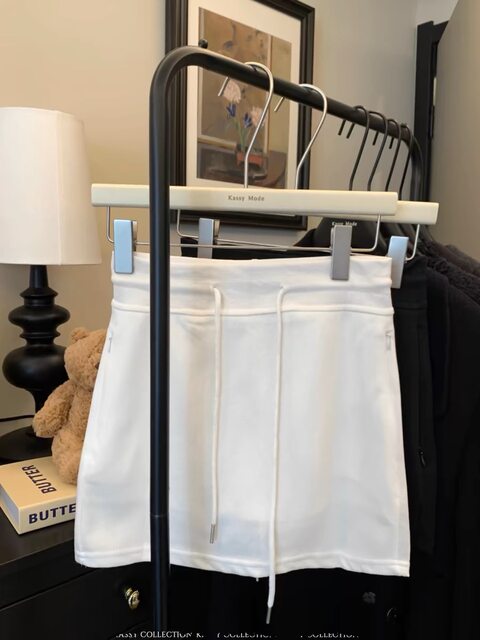 Spicy girl drawing rope bag hip skirt female 2023 summer new Korean version of design sense sports high -waist A -line skirt