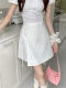 Design-sensual lace-up white skirt for women with large-size summer anti-exposure high-waisted A-line skirt irregular hip-covered short skirt