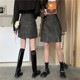 Large size retro PU leather skirt leopard print short skirt for women in autumn and winter high waist A-line skirt mid-length slit hip-pack skirt
