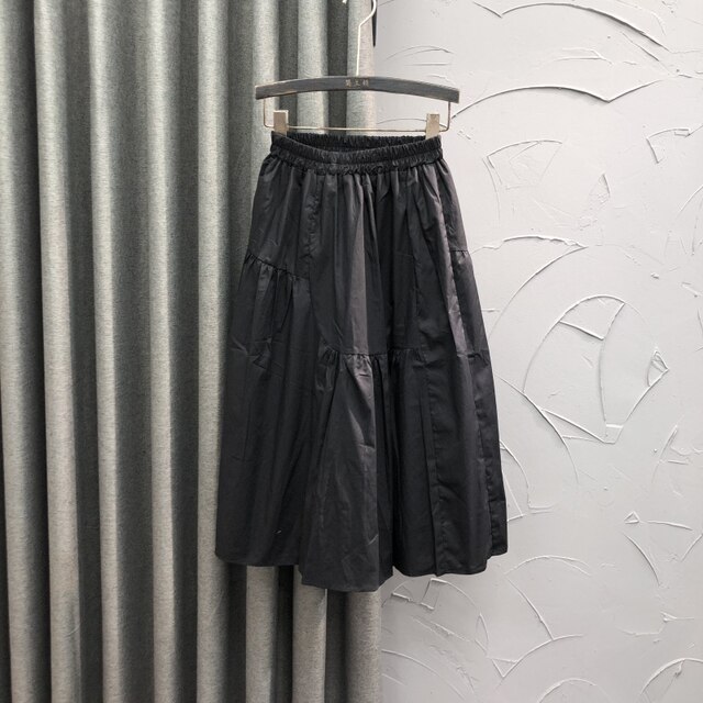Korean style white elastic waist casual splicing skirt for women in summer fashion loose and fashionable A-line large sway midi skirt