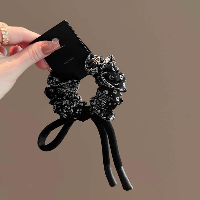 
Retro pattern black small intestine circle high-end texture hair rope headwear 2025 new bow knot ponytail headband