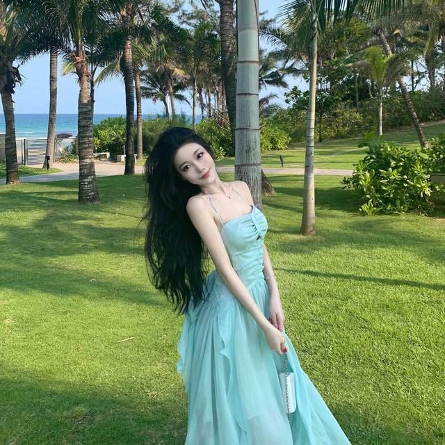 Thailand travel photo beach skirt women's summer temperament backless halterneck suspender dress seaside vacation fairy long skirt
