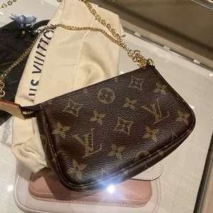 LOUIS VUITTON Mini Pochette Accessoires Monogram Canvas Fuchsia M81633