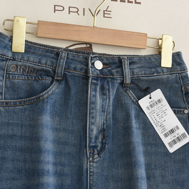 Iran 2025 summer new high-waisted slim pocket embroidery design mid-length denim slit skirt