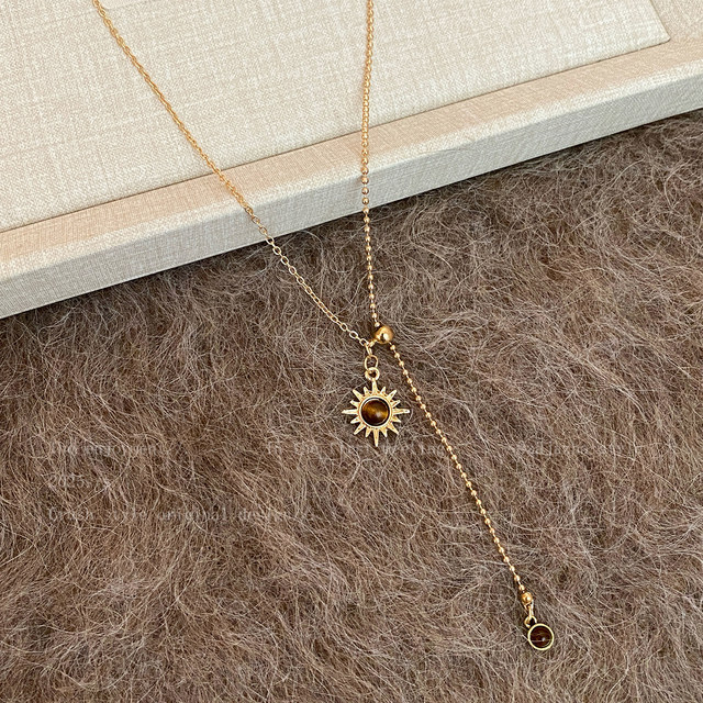 Tiger eye stone sunflower necklace women's autumn and winter Maillard retro temperament long sweater chain light luxury high-end accessories