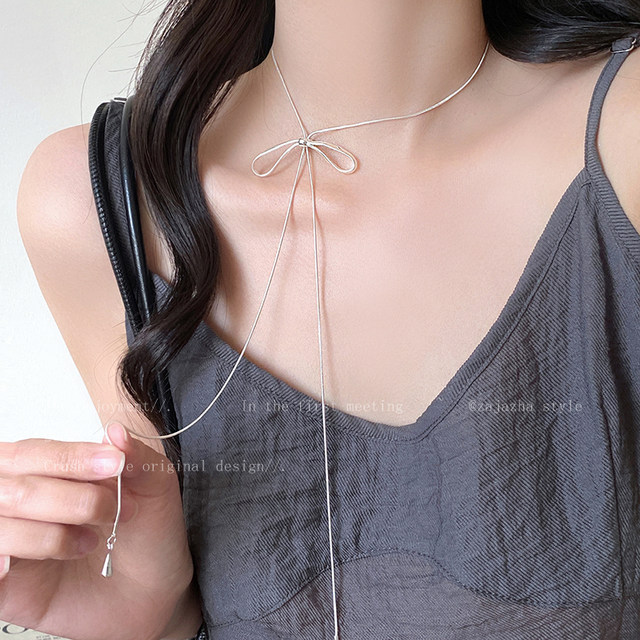 Bow pendant pull-out necklace for women in autumn and winter Korean style long decorative sweater chain silver high-end accessories to wear