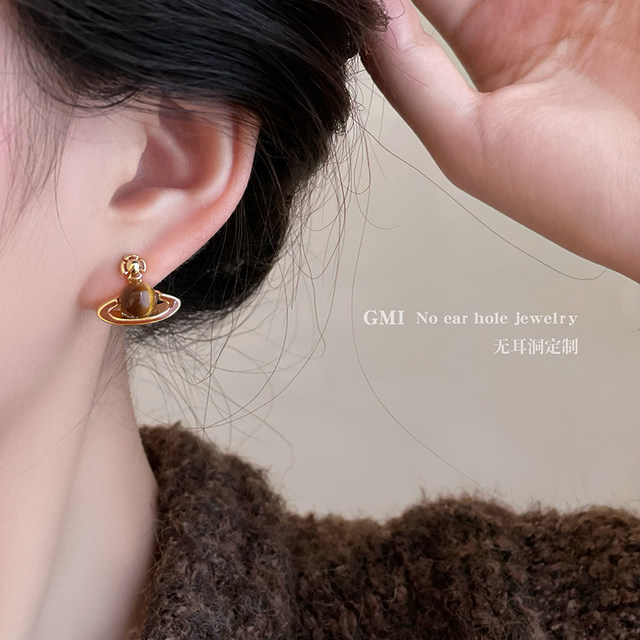 Queen Mother Meladhe's Saturn tiger's eye stone ear clip without piercing female niche high-end earrings autumn and winter earrings earrings