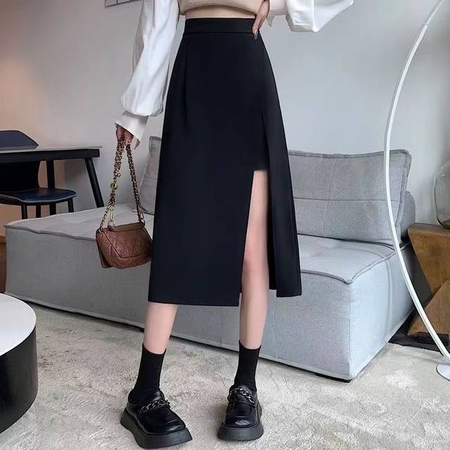 Pear-shaped body large size black fish bone skirt for women in spring and summer 2025 new fat mm waist-hugging a-line hip-packing umbrella skirt
