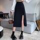Pear-shaped body large size black fish bone skirt for women in spring and summer 2025 new fat mm waist-hugging a-line hip-packing umbrella skirt
