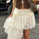 Asymmetric design sense Girl short skirt summer new lace stitching flowers decorate individual skirt
