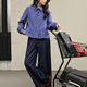Wide -colored MIU style blue plaid shirt female 2025 spring new ruffled long -sleeved shirt shirt short autumn