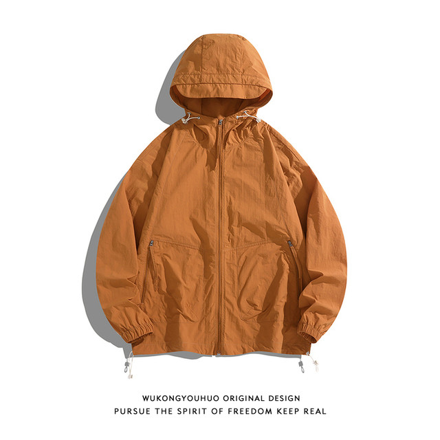 Wukong has a stock summer thin light and breathable sunscreen jacket for men and women fashion brand couples UV skin clothing
