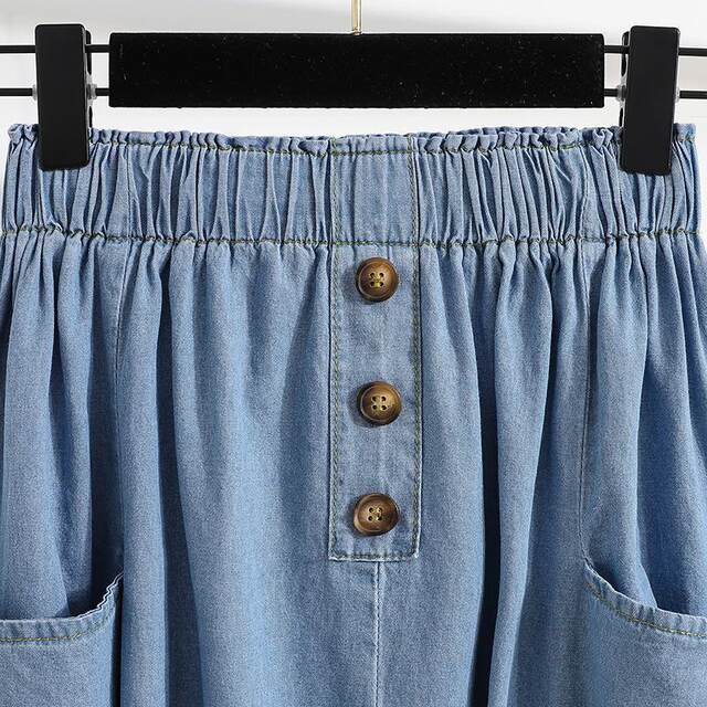 Denim skirt elastic waist solid color 2023 spring and summer new style literary mid-length large pocket button a-line skirt