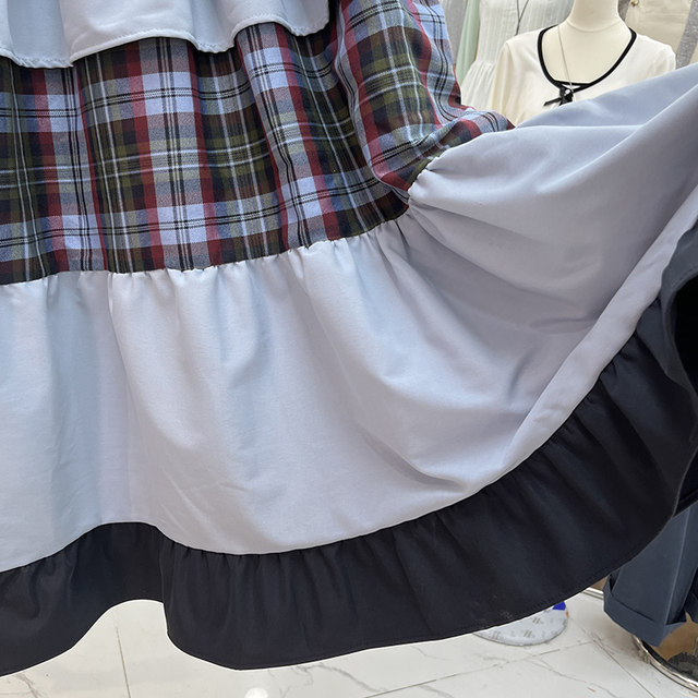 Retro contrasting plaid spliced ​​ruffled skirt for women in spring and summer 2025 new design a-line cake skirt