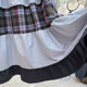 Retro contrasting plaid spliced ​​ruffled skirt for women in spring and summer 2025 new design a-line cake skirt