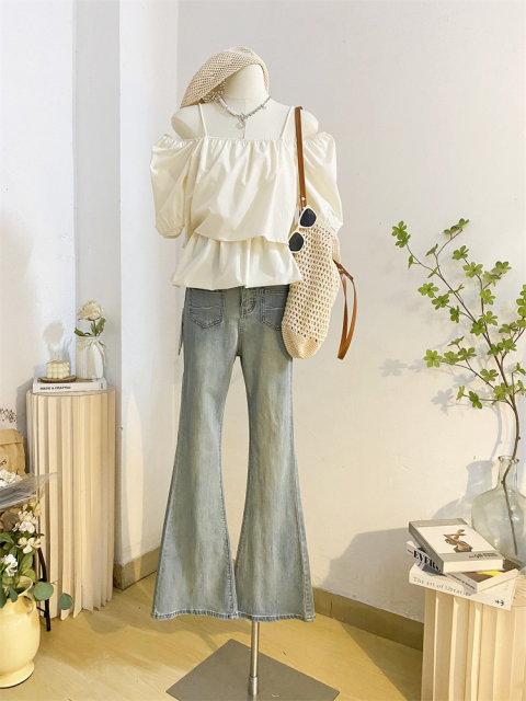 An off -the -shoulder suspender word collar bubble sleeve shirt female summer design sense short folds, waist, waist collar doll shirt top