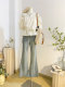 An off -the -shoulder suspender word collar bubble sleeve shirt female summer design sense short folds, waist, waist collar doll shirt top