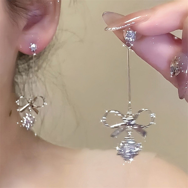 Tassel bow mosquito coil disc ear clip for women without pierced ears niche design earrings for women autumn and winter versatile long earrings