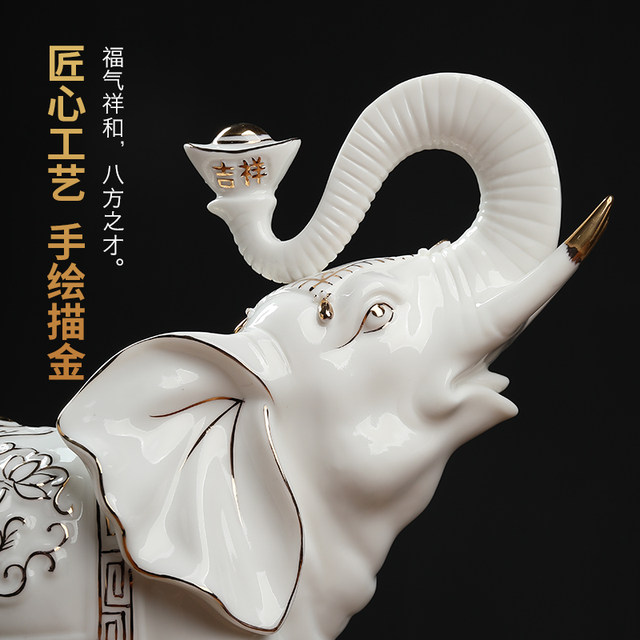 Chinese white ceramic elephant ornaments, a pair of high-end housewarming and opening gifts, living room wine cabinet, desktop fortune-enhancing decorations