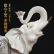 Chinese white ceramic elephant ornaments, a pair of high-end housewarming and opening gifts, living room wine cabinet, desktop fortune-enhancing decorations