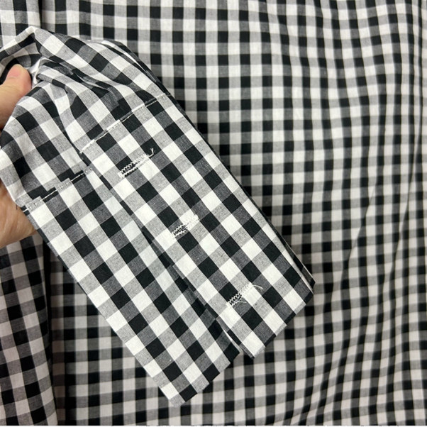Retro black and white plaid one-length neck long-sleeved shirt for women in spring 2025 new mid-length slim pullover shirt
