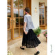 Huaji Q479 black temperament versatile lace skirt 2025 new summer elastic waist cake skirt mid-length
