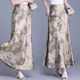 Satin French tie-dye printed fishtail skirt 2025 new high-waisted slim retro long skirt
