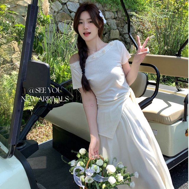 Hangzhou four-season green women's clothing Guangzhou thirteen-row lace lace one-shoulder strap irregular shirt top summer