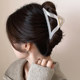 Simple and versatile geometric hollow triangle large hair clip for women fashion high-end hair clip niche shark clip