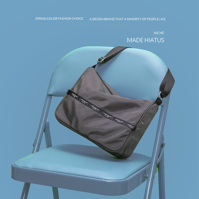 Hiatus Korean version of niche design brand nylon cloth shoulder bag ins, simple casual men's and women's same shoulder bag