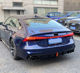 Suitable for 19-25 Audi A7 modified S7 four-out exhaust tail throat a7l rear tail lip with navigation light rear surround