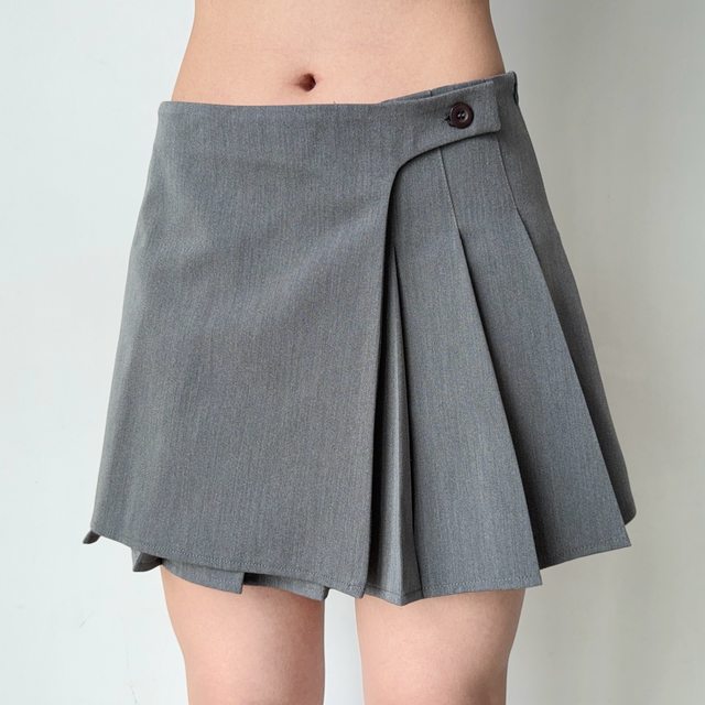 Go Girl Go European and American style niche design asymmetrical pleated skirt for women with low waist A-line short skirt, anti-exposed
