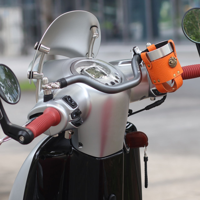 Suitable for motorcycle crossbar logo Django 150 coffee modified mobile phone holder extension rod multi-purpose child armrest