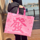 Laminated non-woven bag Customized gift bag Thicken environmentally friendly bag Fashion new style clothing handbag wholesale New Year bag
