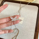 Silver butterfly long necklace women's autumn and winter new decorative sweater chain clavicle chain light luxury niche high-end accessories