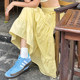 MSYOUCAN Looking forward to the bright summer dopamine yellow skirt with bow splicing lace-up versatile long skirt
