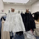 White sweet pleated skirt for women in summer 2025 new high waist A-line umbrella skirt fluffy skirt jk short skirt trendy ins
