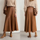 AMII2024 winter new elegant commuting environmentally friendly PU leather skirt feminine A -line skirt skirt skirt skirt
