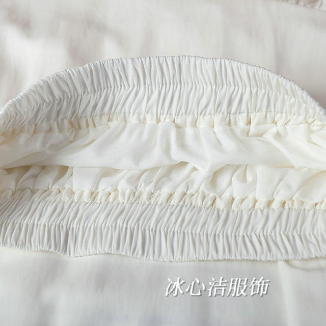 Bow irregular skirt 2025 spring and summer new high-waisted lace-up A-line skirt with wood ears mid-length skirt