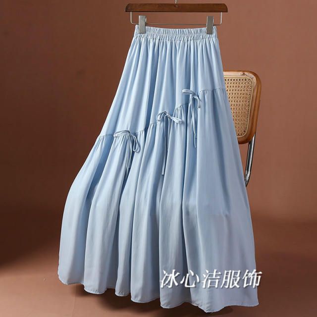 Ouruo style irregular splicing bow skirt 2025 spring and summer new high-waisted slim A-line long skirt