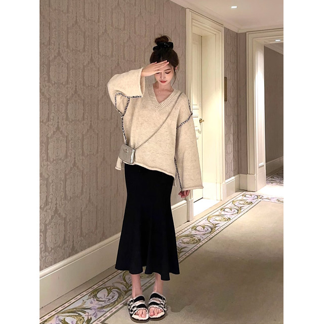 Pregnant women skirts women's spring and autumn and winter mid -length black pregnancy A -line knitted hip skirt one -step skirt
